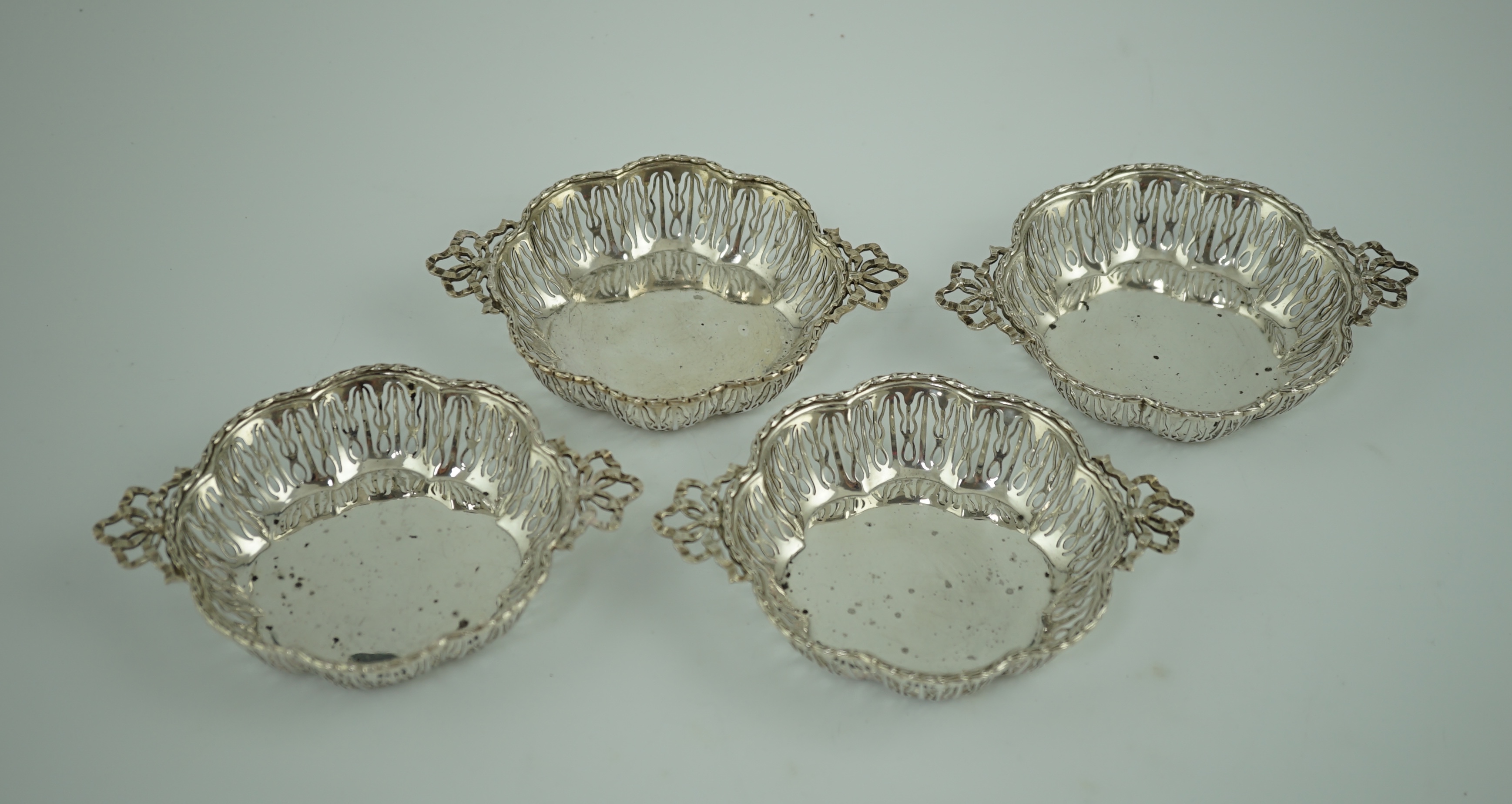 A set of four George V pierced silver bon bon dishes, by Mappin & Webb